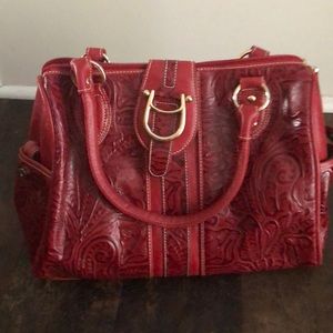 M.C red leather handbag